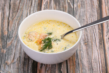 Salmon cream soup served dill