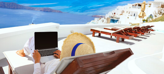 Nomad digital in a vacation working freelancer as remotely with bright scenic view of the...