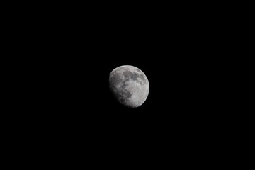 Bright moon disk on dark sky in the night