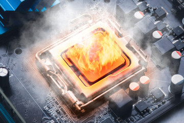 Flames ignite the computer processors on the motherboard and smoke