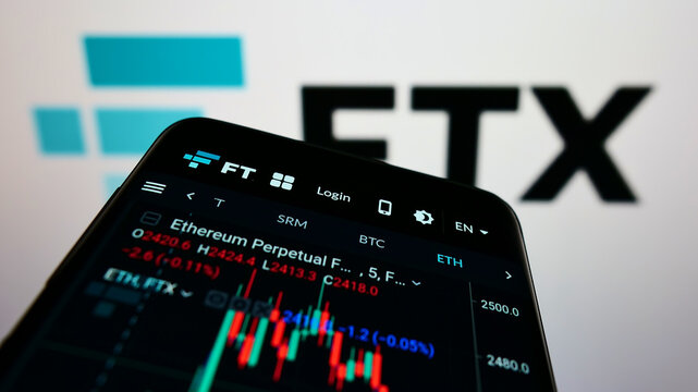 Stuttgart, Germany - 01-28-2022: Mobile phone with webpage of cryptocurrency exchange company FTX Trading on screen in front of business logo. Focus on top-left of phone display.