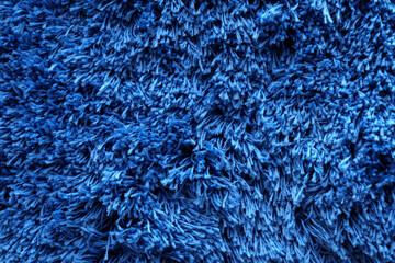 Blue carpet background, blue fabric texture background, closeup