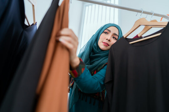 Muslim dressmakers working on their new collection.