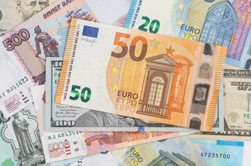Money background from different countries: dollars, euros, rubles. International currencies. 50 euro