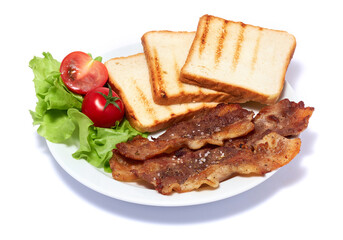 Cooked slices of bacon, grilled toast and salad on white ceramic plate isolated on white background