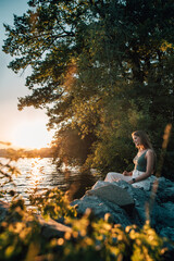 Girl at Lake Lucerne in Switzerland at Sunset