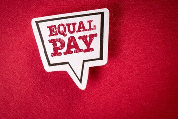 EQUAL PAY. Speech bubble with text on red background