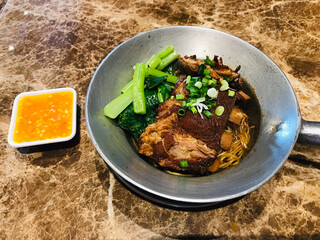 Roasted Pork Rib Noodles in Clay Pot.