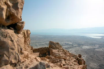 Foto auf Acrylglas image of the Masada fortress against the backdrop of the Dead Sea © reznik_val