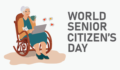 Fototapeta premium World Senior Citizen's Day. Happy grandmother with the laptop computer