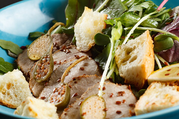 Veal with mixed caper salad and crispy baguette, delicious veal, crispy baguette