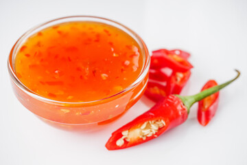 sweet chili sauce on a white acrylic background