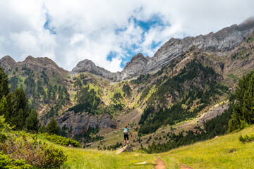 A hiker enjoying the mountain on vacation in the Pyrenees, Alto Gallego, Huesca, Aragon