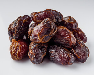 juicy royal dates on a white acrylic background
