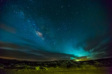 Fototapeta premium Night landscape showing milky way in the moroccan desert
