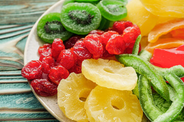 set of various dried fruits on a wooden rustic background