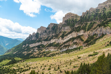 Fototapeta na wymiar Mountains of the Valle de Tena next to the Arco de Piedrafita in the Pyrenees in Biescas in summer