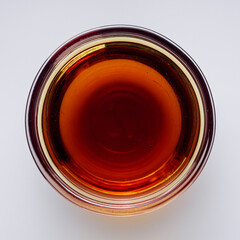 fragrant fish sauce on a white acrylic background