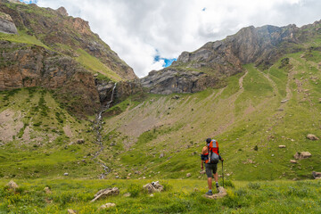 Fototapeta premium Visiting the Salto de Tendenera Waterfall in the Pyrenees in the Ripera Valley, Huesca