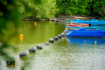 Empty blue paddle boats in London Park