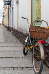 Fototapeta na wymiar Newspaper in a bicycle with basket