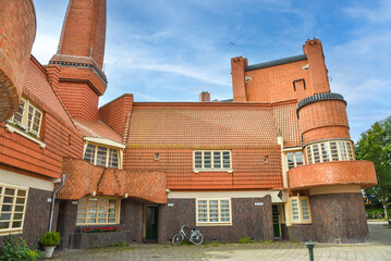 Amsterdam, Netherlands. June 2022. Residential complex built in the architectural style of The...