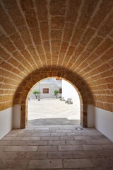 An alley in Specchia, a medieval village in the Puglia region of Italy.