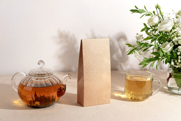 Tea branding and packaging mockup. Blank tea packaging mockup with tea. Kraft paper pack  and empty...