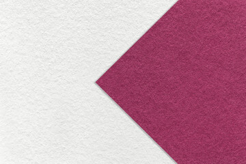 Fototapeta premium Texture of white and purple paper background, half two colors with arrow, macro. Structure of craft wine cardboard.