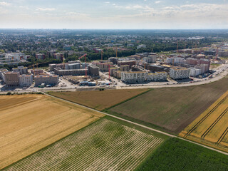 Aerial view of the construction site for new buildings for living in Munich Freiham. A new district...