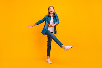Fototapeta na wymiar Full length portrait of crazy positive person enjoy dancing chilling isolated on yellow color background