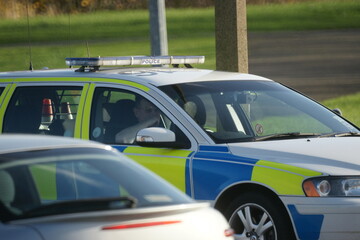 British traffic police attending Incident on blue light,  Police car, Yorkshire, England