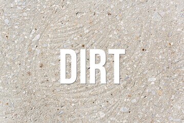 DIRT - word on concrete background. Cement floor, wall.