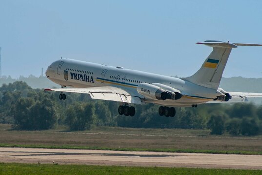 Ukrainian four-engine jet passenger plane Il-62 takes off from concrete runway. Blurred background. Inscription "Ukraine" on fuselage. MAKS-2007. Selective focus. Zhukovsky, Russia - August 21, 2007