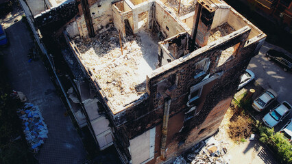 a house in Irpen destroyed by shells of Russian occupiers, drone view