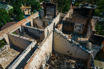 a house in Irpen destroyed by shells of Russian occupiers, drone view