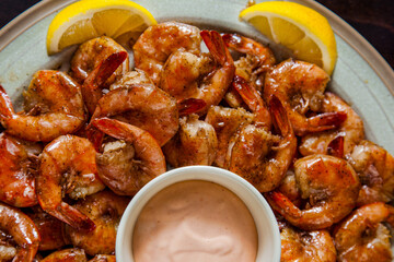 Shrimps in sweet and sour sauce and a glass of beer