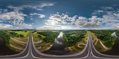 aerial full spherical seamless hdr 360 panorama over huge road junction and bridge over river of...