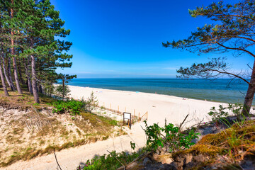Fototapeta na wymiar Landscape of the summer beach of the Baltic Sea in Sztutowo, Poland