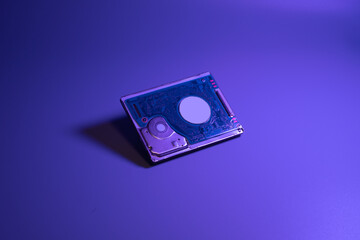 Close up of hard disk with blue background,HDD,Security concept