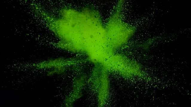 Super Slow Motion of Green Powder Explosion Isolated on Black Background. Filmed on High Speed Cinema Camera, 1000fps.