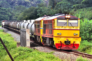 Thai tanker freight-train by diesel locomotive on the railway