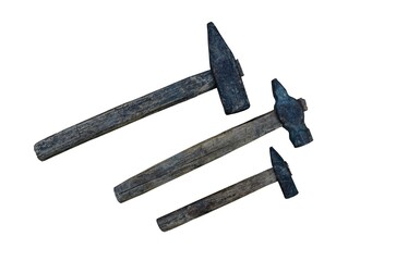 wall with rusty hammers in old garage .