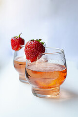 sparkling rose wine with fresh strawberry