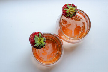 sparkling rose wine with fresh strawberry