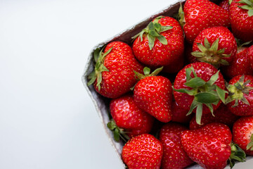 paper basket with fresh strawberry. eco friendly