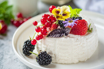 ..Fresh ricotta with berries and flowers