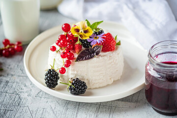 ..Fresh ricotta with berries and flowers