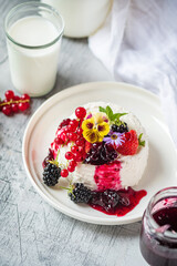 ..Fresh ricotta with berries and flowers
