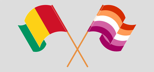 Crossed and waving flags of Guinea and Lesbian Pride